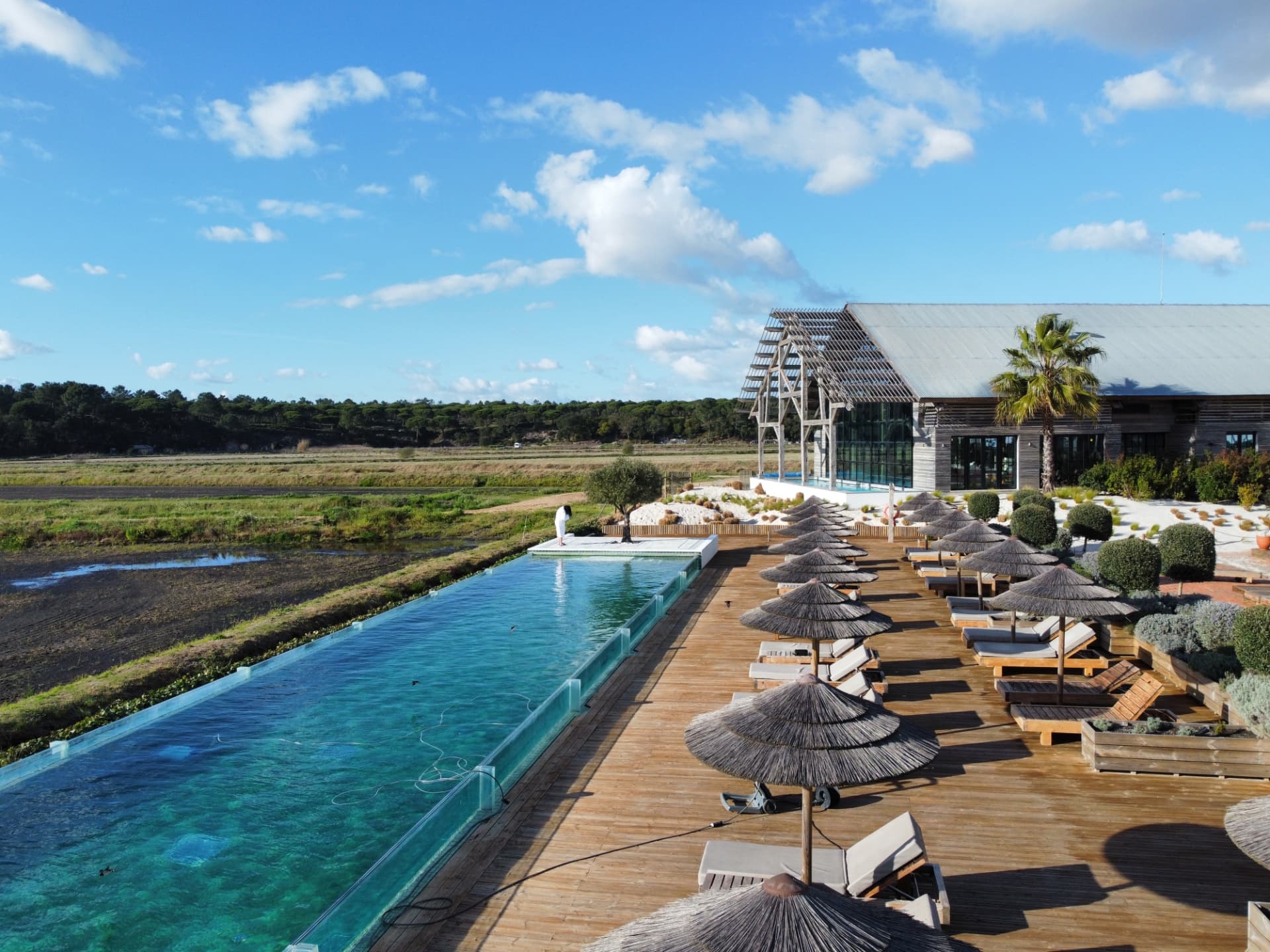 Aerial view of a resort pool and sun terrace in Portugal